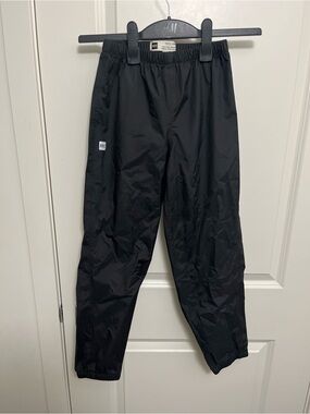MEC Youth Black Rain Pants in size 10 (9-10 y.o.).